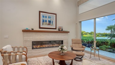 Situated within the gated Queens Harbour enclave of Bay Isles on Longboat Key Golf Club Resort in Florida - for sale on GolfHomes.com, golf home, golf lot