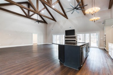 This exquisite custom built home offers 4 spacious bedrooms and on Harbor Club Golf and Country Club in Georgia - for sale on GolfHomes.com, golf home, golf lot