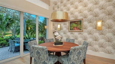Situated within the gated Queens Harbour enclave of Bay Isles on Longboat Key Golf Club Resort in Florida - for sale on GolfHomes.com, golf home, golf lot
