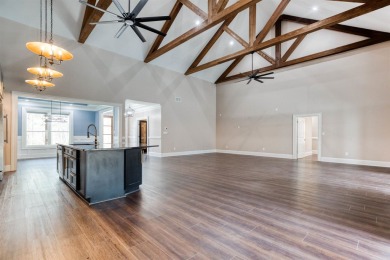 This exquisite custom built home offers 4 spacious bedrooms and on Harbor Club Golf and Country Club in Georgia - for sale on GolfHomes.com, golf home, golf lot