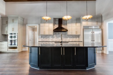 This exquisite custom built home offers 4 spacious bedrooms and on Harbor Club Golf and Country Club in Georgia - for sale on GolfHomes.com, golf home, golf lot