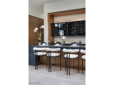 The Taylor Estate's elevated location is set btwn striking on The Summit Club in Nevada - for sale on GolfHomes.com, golf home, golf lot