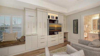 Situated within the gated Queens Harbour enclave of Bay Isles on Longboat Key Golf Club Resort in Florida - for sale on GolfHomes.com, golf home, golf lot