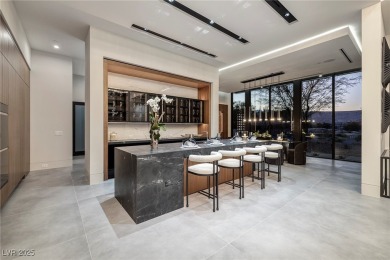 The Taylor Estate's elevated location is set btwn striking on The Summit Club in Nevada - for sale on GolfHomes.com, golf home, golf lot