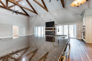 This exquisite custom built home offers 4 spacious bedrooms and on Harbor Club Golf and Country Club in Georgia - for sale on GolfHomes.com, golf home, golf lot