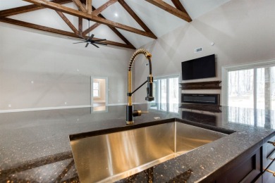 This exquisite custom built home offers 4 spacious bedrooms and on Harbor Club Golf and Country Club in Georgia - for sale on GolfHomes.com, golf home, golf lot