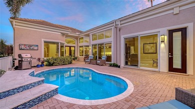 Situated within the gated Queens Harbour enclave of Bay Isles on Longboat Key Golf Club Resort in Florida - for sale on GolfHomes.com, golf home, golf lot