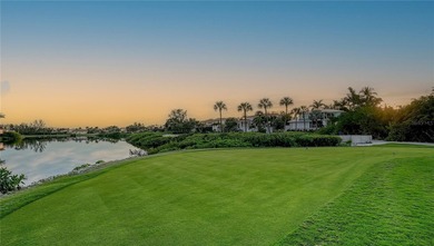 Situated within the gated Queens Harbour enclave of Bay Isles on Longboat Key Golf Club Resort in Florida - for sale on GolfHomes.com, golf home, golf lot