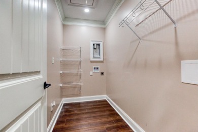 This exquisite custom built home offers 4 spacious bedrooms and on Harbor Club Golf and Country Club in Georgia - for sale on GolfHomes.com, golf home, golf lot