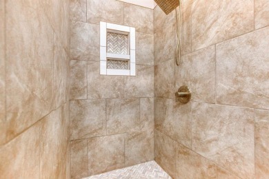 This exquisite custom built home offers 4 spacious bedrooms and on Harbor Club Golf and Country Club in Georgia - for sale on GolfHomes.com, golf home, golf lot