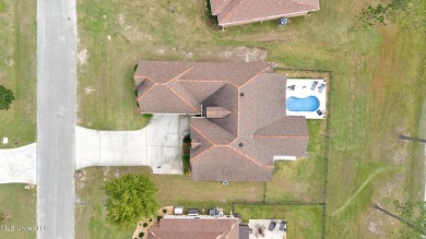 Open, bright and inviting!  Built by Structures. Spacious open on Diamondhead Country Club in Mississippi - for sale on GolfHomes.com, golf home, golf lot