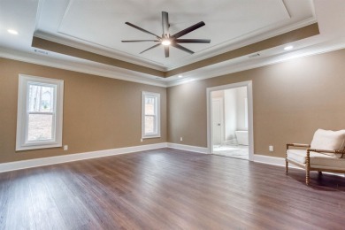 This exquisite custom built home offers 4 spacious bedrooms and on Harbor Club Golf and Country Club in Georgia - for sale on GolfHomes.com, golf home, golf lot