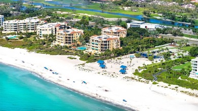 Situated within the gated Queens Harbour enclave of Bay Isles on Longboat Key Golf Club Resort in Florida - for sale on GolfHomes.com, golf home, golf lot