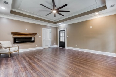 This exquisite custom built home offers 4 spacious bedrooms and on Harbor Club Golf and Country Club in Georgia - for sale on GolfHomes.com, golf home, golf lot