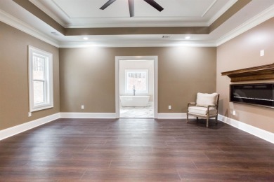 This exquisite custom built home offers 4 spacious bedrooms and on Harbor Club Golf and Country Club in Georgia - for sale on GolfHomes.com, golf home, golf lot