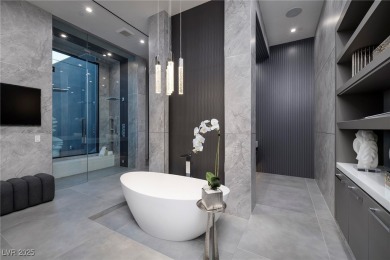 The Taylor Estate's elevated location is set btwn striking on The Summit Club in Nevada - for sale on GolfHomes.com, golf home, golf lot