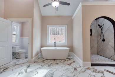 This exquisite custom built home offers 4 spacious bedrooms and on Harbor Club Golf and Country Club in Georgia - for sale on GolfHomes.com, golf home, golf lot