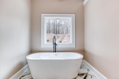 This exquisite custom built home offers 4 spacious bedrooms and on Harbor Club Golf and Country Club in Georgia - for sale on GolfHomes.com, golf home, golf lot