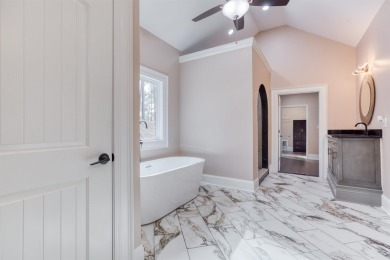 This exquisite custom built home offers 4 spacious bedrooms and on Harbor Club Golf and Country Club in Georgia - for sale on GolfHomes.com, golf home, golf lot