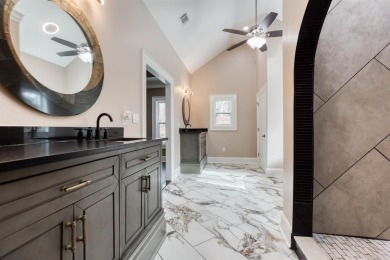 This exquisite custom built home offers 4 spacious bedrooms and on Harbor Club Golf and Country Club in Georgia - for sale on GolfHomes.com, golf home, golf lot