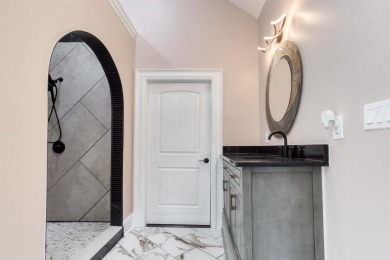 This exquisite custom built home offers 4 spacious bedrooms and on Harbor Club Golf and Country Club in Georgia - for sale on GolfHomes.com, golf home, golf lot