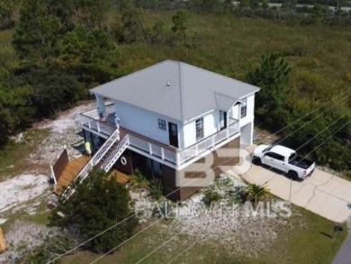Ready for rental season with this versatile beach house! Totally on Kiva Dunes Golf Club in Alabama - for sale on GolfHomes.com, golf home, golf lot