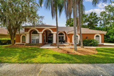 Stunning 4BR/2.5BA pool home on an oversized lot in the gated on East Lake Woodlands Country Club in Florida - for sale on GolfHomes.com, golf home, golf lot