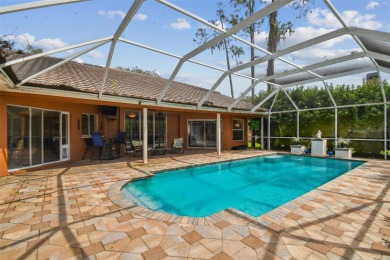 Stunning 4BR/2.5BA pool home on an oversized lot in the gated on East Lake Woodlands Country Club in Florida - for sale on GolfHomes.com, golf home, golf lot