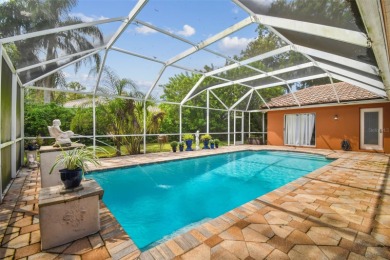 Stunning 4BR/2.5BA pool home on an oversized lot in the gated on East Lake Woodlands Country Club in Florida - for sale on GolfHomes.com, golf home, golf lot