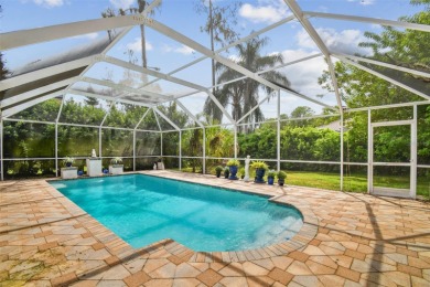 Stunning 4BR/2.5BA pool home on an oversized lot in the gated on East Lake Woodlands Country Club in Florida - for sale on GolfHomes.com, golf home, golf lot