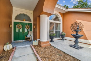 Stunning 4BR/2.5BA pool home on an oversized lot in the gated on East Lake Woodlands Country Club in Florida - for sale on GolfHomes.com, golf home, golf lot
