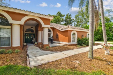 Stunning 4BR/2.5BA pool home on an oversized lot in the gated on East Lake Woodlands Country Club in Florida - for sale on GolfHomes.com, golf home, golf lot