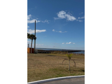 INVEST and WAIT or Build your dream home on this spacious .55 on Indian Lake Estates Golf and Country Club in Florida - for sale on GolfHomes.com, golf home, golf lot