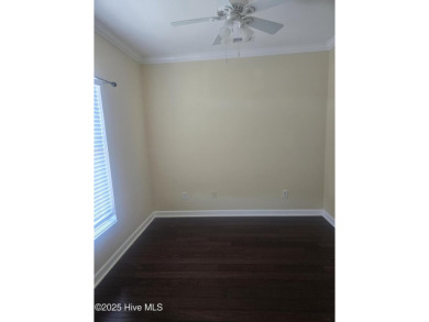 A beach getaway with three bedrooms PLUS an income producing on Sea Trail Golf Resort in North Carolina - for sale on GolfHomes.com, golf home, golf lot