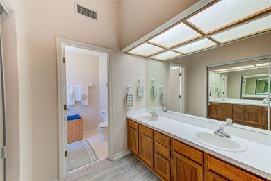 Ground floor condo in the highly desirable East Lake Woodlands on East Lake Woodlands Country Club in Florida - for sale on GolfHomes.com, golf home, golf lot