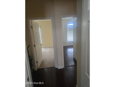 A beach getaway with three bedrooms PLUS an income producing on Sea Trail Golf Resort in North Carolina - for sale on GolfHomes.com, golf home, golf lot
