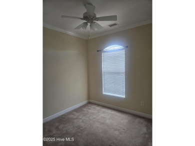 A beach getaway with three bedrooms PLUS an income producing on Sea Trail Golf Resort in North Carolina - for sale on GolfHomes.com, golf home, golf lot