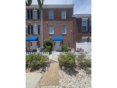A beach getaway with three bedrooms PLUS an income producing on Sea Trail Golf Resort in North Carolina - for sale on GolfHomes.com, golf home, golf lot