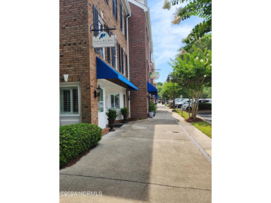 A beach getaway with three bedrooms PLUS an income producing on Sea Trail Golf Resort in North Carolina - for sale on GolfHomes.com, golf home, golf lot