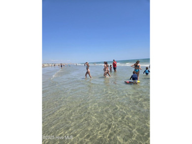 A beach getaway with three bedrooms PLUS an income producing on Sea Trail Golf Resort in North Carolina - for sale on GolfHomes.com, golf home, golf lot