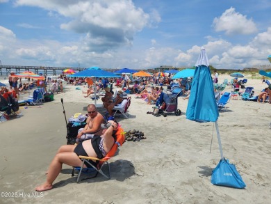 A beach getaway with three bedrooms PLUS an income producing on Sea Trail Golf Resort in North Carolina - for sale on GolfHomes.com, golf home, golf lot