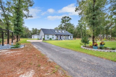 Discover this stunning, one-of-a-kind home built by Pafford on Wildwood Country Club in Florida - for sale on GolfHomes.com, golf home, golf lot