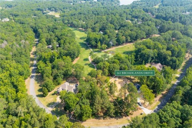 Nestled on the tee boxes of the #5 Signature Hole of the Jack on Great Waters Course At Reynolds Plantation in Georgia - for sale on GolfHomes.com, golf home, golf lot