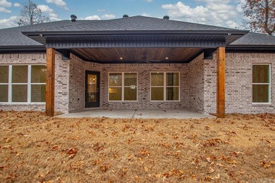 Step inside this beautiful new 4 bed, 2.5 bath home and fall in on Silver Springs Country Club in Arkansas - for sale on GolfHomes.com, golf home, golf lot