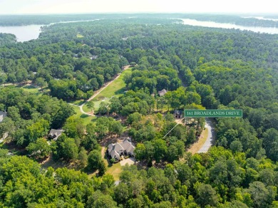 Nestled on the tee boxes of the #5 Signature Hole of the Jack on Great Waters Course At Reynolds Plantation in Georgia - for sale on GolfHomes.com, golf home, golf lot