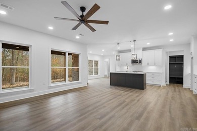 Step inside this beautiful new 4 bed, 2.5 bath home and fall in on Silver Springs Country Club in Arkansas - for sale on GolfHomes.com, golf home, golf lot