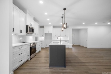 Step inside this beautiful new 4 bed, 2.5 bath home and fall in on Silver Springs Country Club in Arkansas - for sale on GolfHomes.com, golf home, golf lot