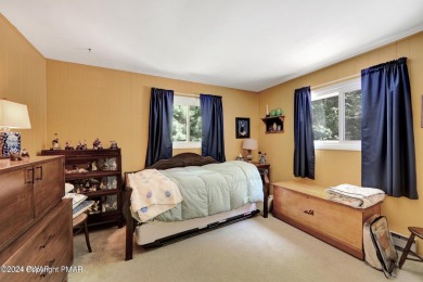 This custom-built and lovingly cared-for home loaded with modern on Pocono Farms Country Club in Pennsylvania - for sale on GolfHomes.com, golf home, golf lot