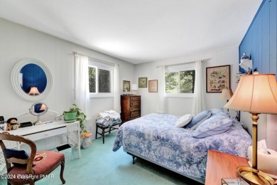 This custom-built and lovingly cared-for home loaded with modern on Pocono Farms Country Club in Pennsylvania - for sale on GolfHomes.com, golf home, golf lot