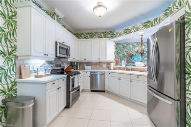 Tucked away in the heart of Pelican Marsh, this beautifully on  in Florida - for sale on GolfHomes.com, golf home, golf lot